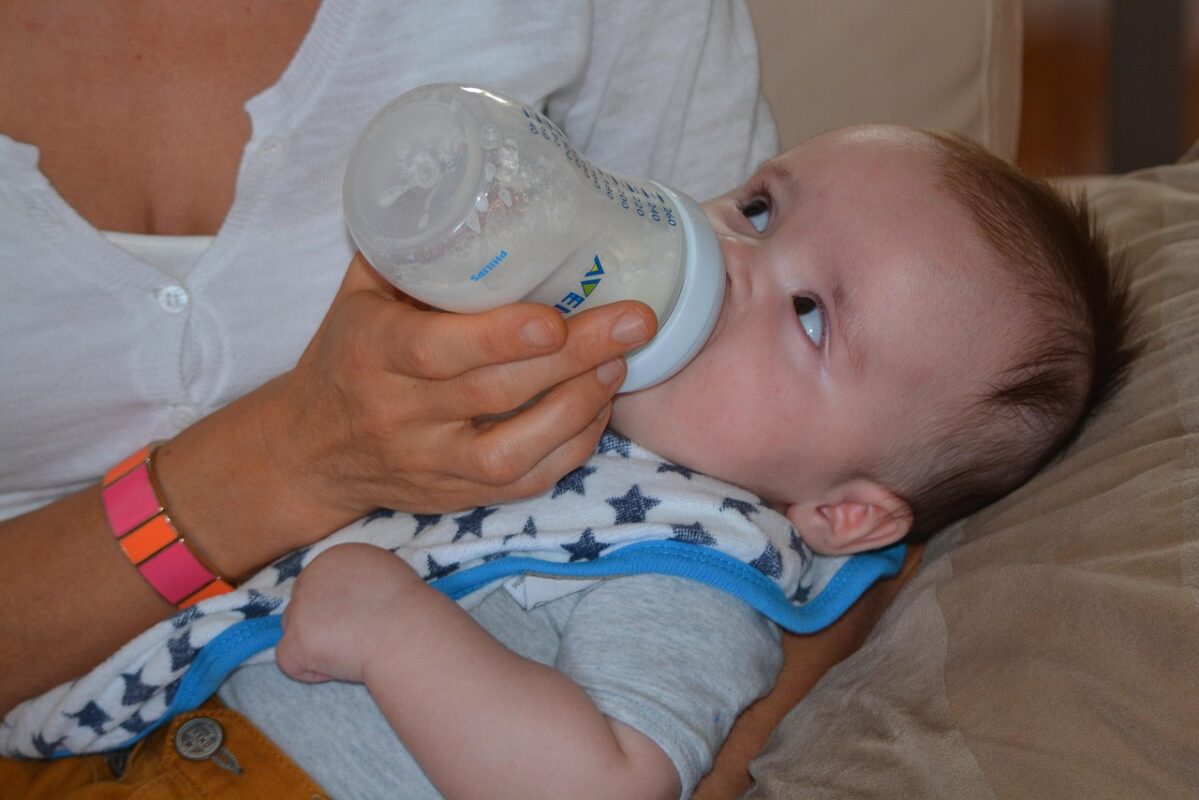 Baby wearing a bandana bib